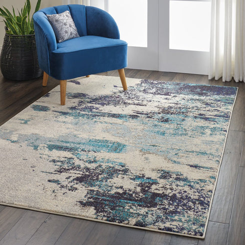 2' X 4' Ivory And Teal Blue Abstract Power Loom Non Skid Area Rug